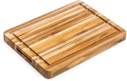 Teakhaus teak wood cutting board with deep juice groove and reversible design