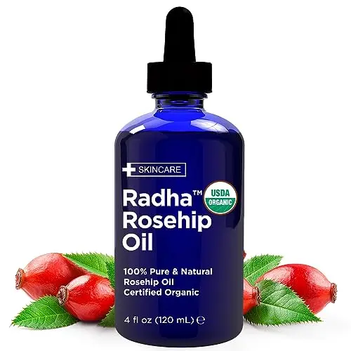 Radha Beauty Organic Rosehip Seed Oil in glass bottle with dropper
