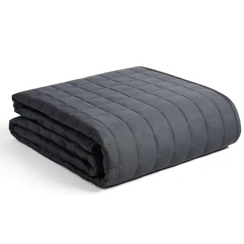 YnM weighted blanket in dark grey showing even weight distribution