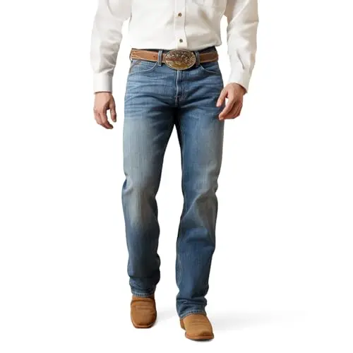 ARIAT men's relaxed stretch boot cut jeans showing comfortable fit over cowboy boots