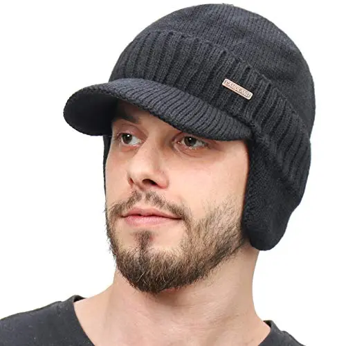 CAMOLAND winter beanie with visor and earflaps in cable knit design