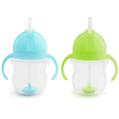 Munchkin Any Angle sippy cup with weighted straw and transition handles in blue and green
