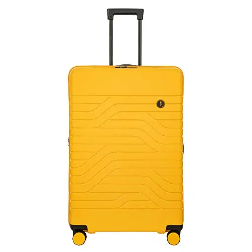 BRIC'S mango-colored hardshell suitcase with decorative lines