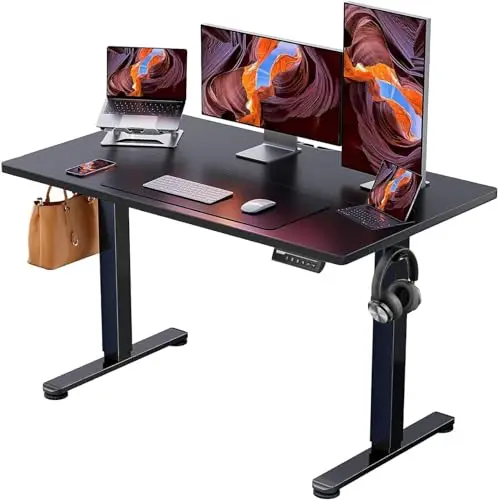 ErGear electric standing desk with black frame and splice board