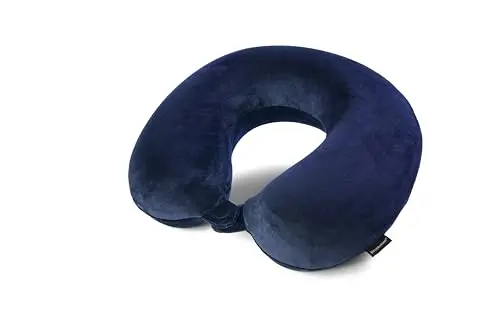 Brookstone blue travel neck pillow showing fleece casing and snap closure
