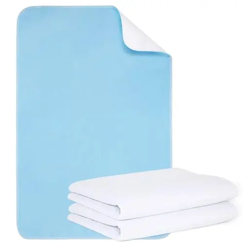 Mancosi reusable incontinence bed pads on a bed