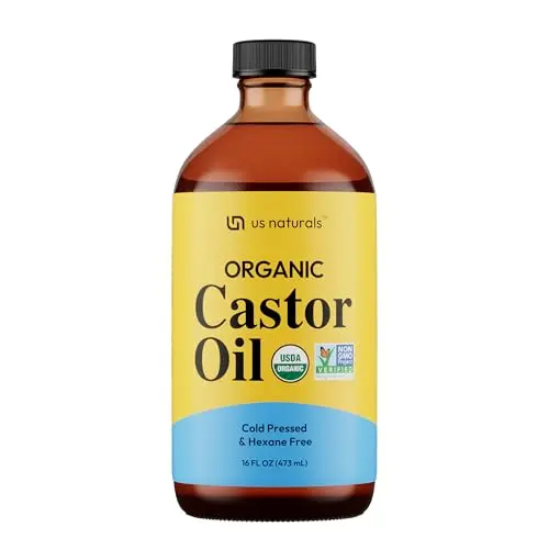 Us Naturals Organic Castor Oil in dark amber glass bottle