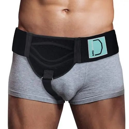 Abdomencare hernia belt showing adjustable straps and two compression pads