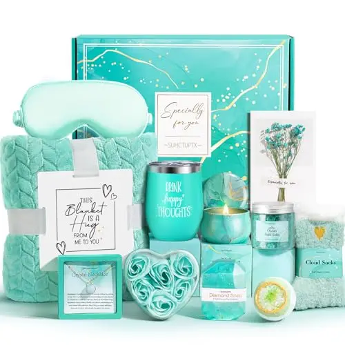 Self care gift basket with blanket, tumbler, necklace, and spa items in ocean theme